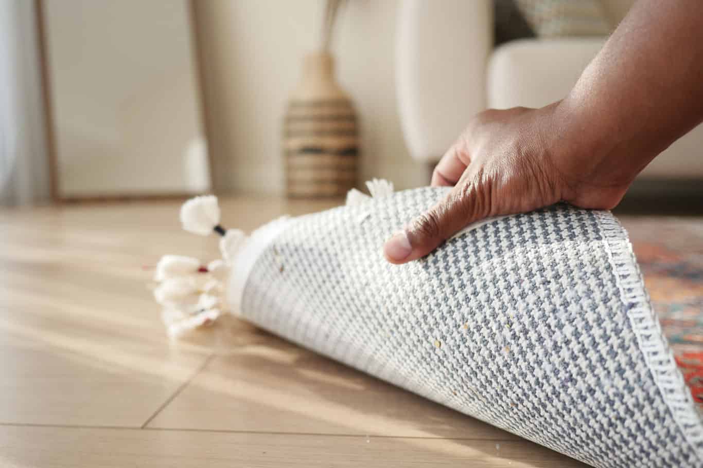 how to uncurl rug