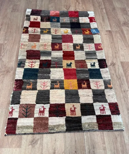 Small, Gabbeh. 120x70cm. £340 (3)