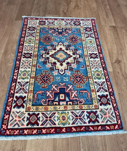 Small, Kazak 88x63cm. £75 (4)