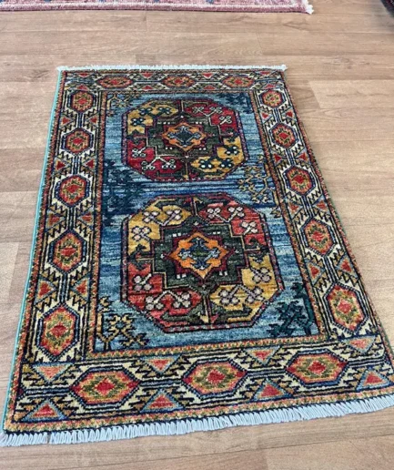 Afghan Kundoz. 87x58cm £175 (3)